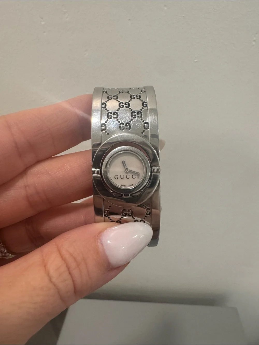 Gucci Silver-Tone GG Engraved Bangle Watch with White Dial